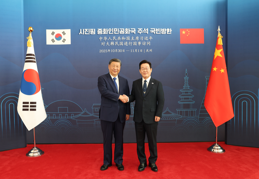 习近平同韩国总统李在明会谈